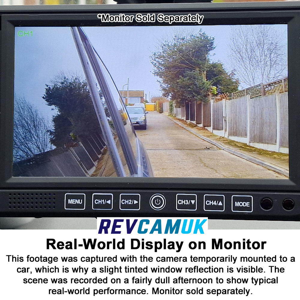 This footage was captured with the camera temporarily mounted to a car, which is why a slight tinted window reflection is visible. The scene was recorded on a fairly dull afternoon to show typical real-world performance.