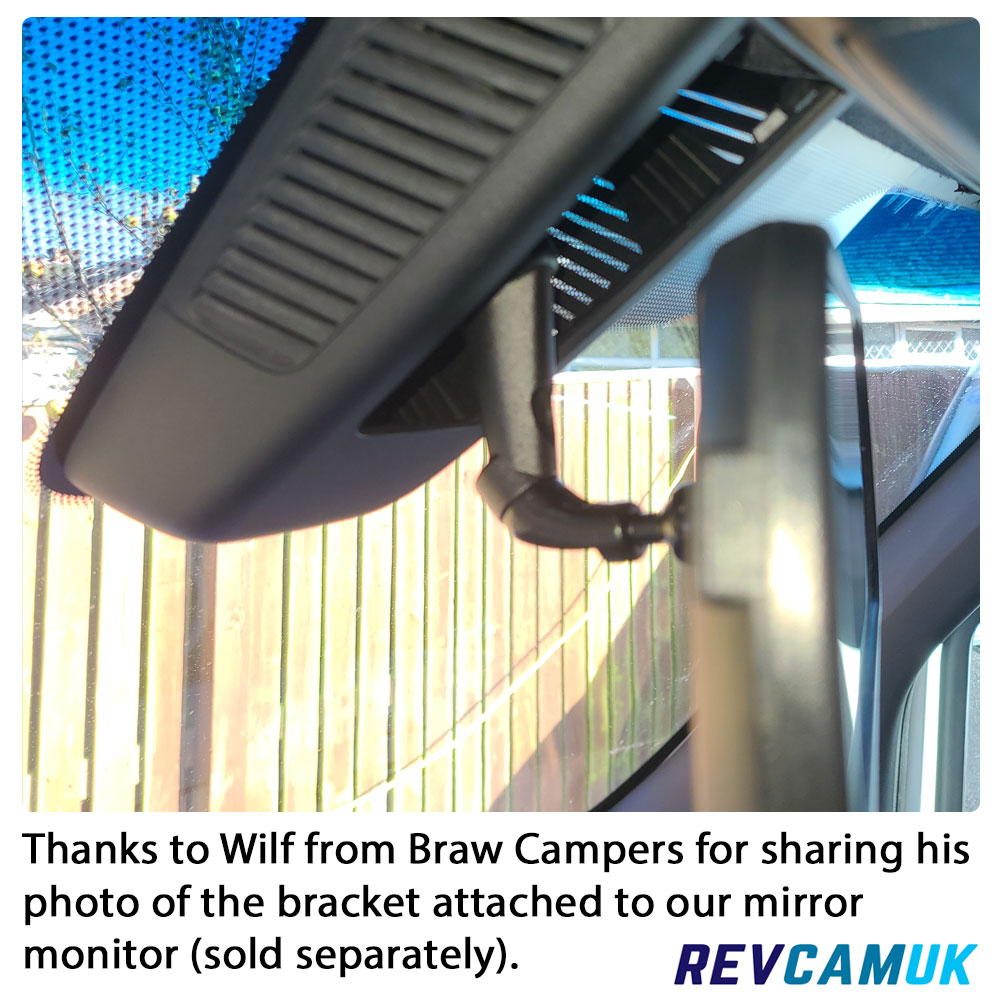 Customer photo showing a mirror monitor fitted to the Mercedes Sprinter overhead mounting point using the bracket, demonstrating the installed position inside the cab.