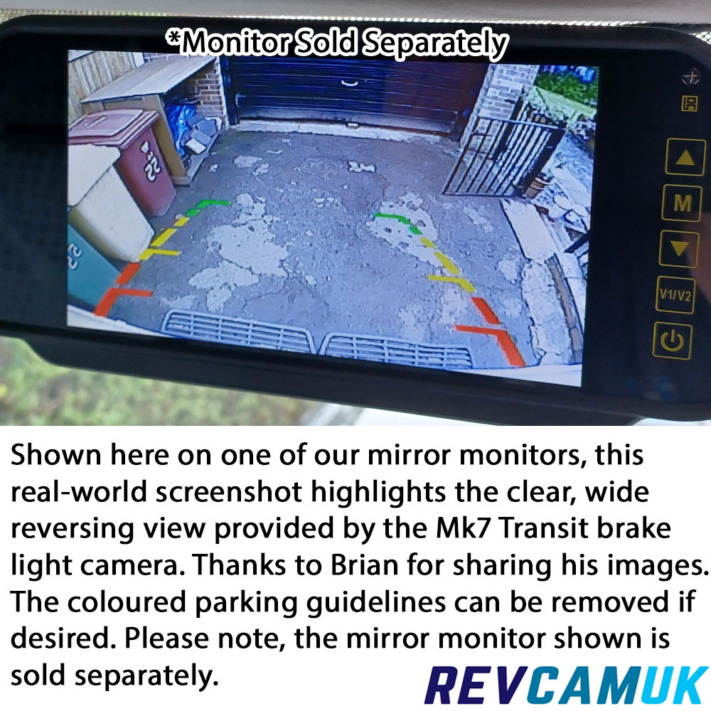 Reversing view from Ford Transit Mk7 brake light camera displayed on a mirror monitor with coloured parking guidelines, shown for demonstration purposes; monitor sold separately.